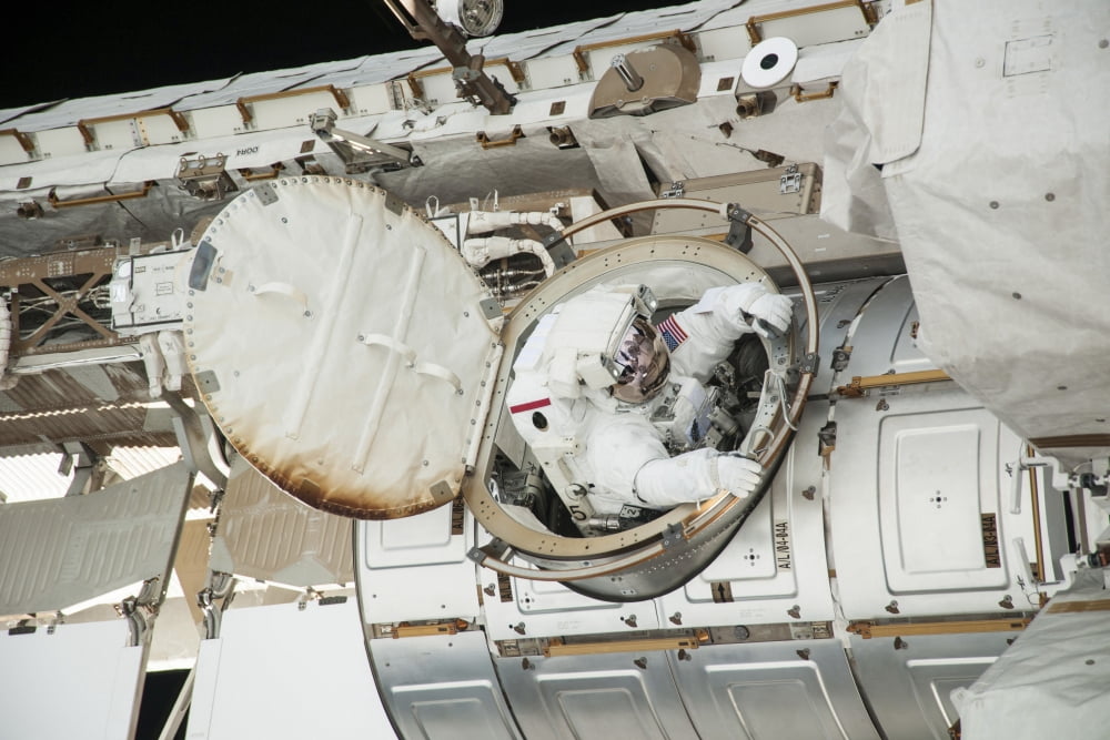 Astronaut exits the Quest airlock for a spacewalk Canvas Art - Stocktrek Images (34 x 23)