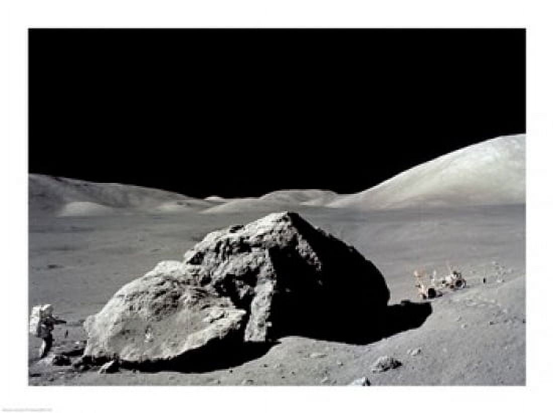 Astronaut standing near a rock on the moon Apollo 17 Canvas Art - (24 x 18)