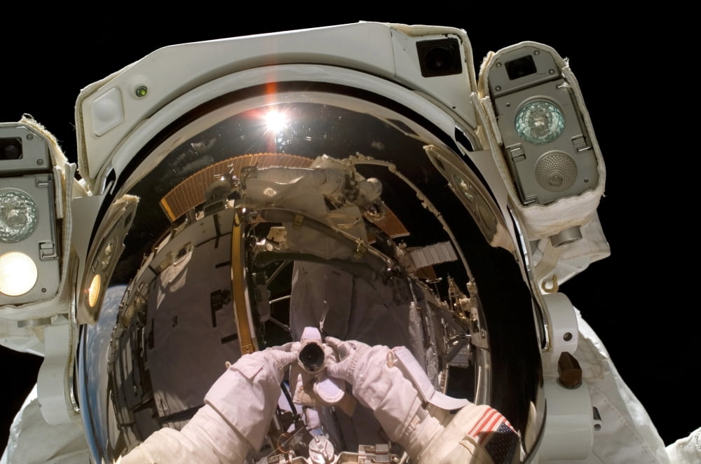 Astronaut takes a self-portrat during a space walk Canvas Art - Stocktrek Images (34 x 23)