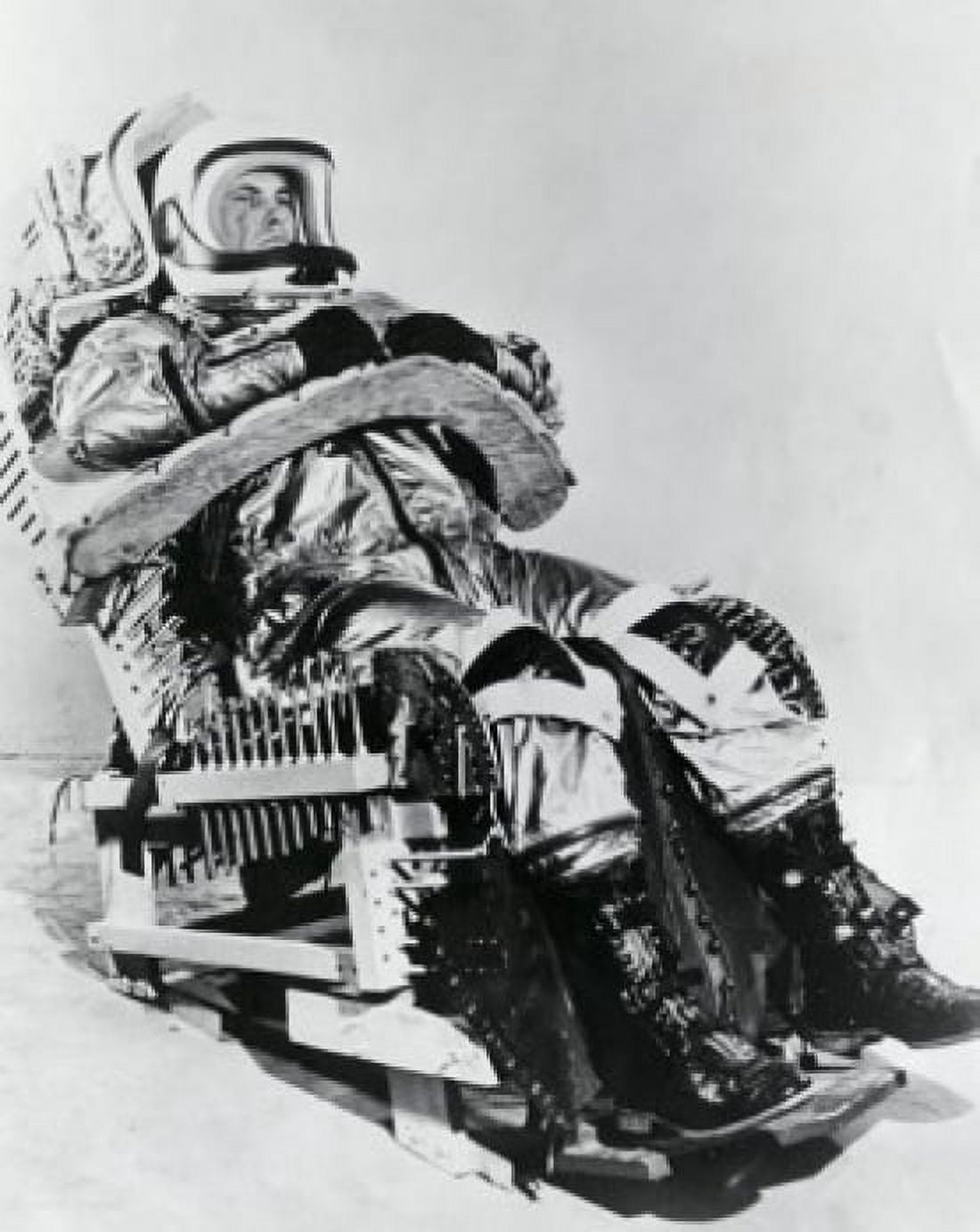 Astronaut wearing an MC-2 Full Pressure space suit and sitting on a chair Prototype Chair for X-15 Test Flight Canvas Art - (18 x 24)