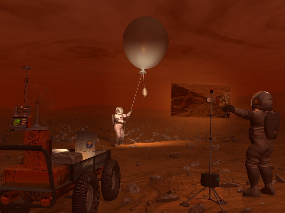 Astronauts release a weather balloon on the surface of Titan Canvas Art - Walter MyersStocktrek Images (33 x 25)