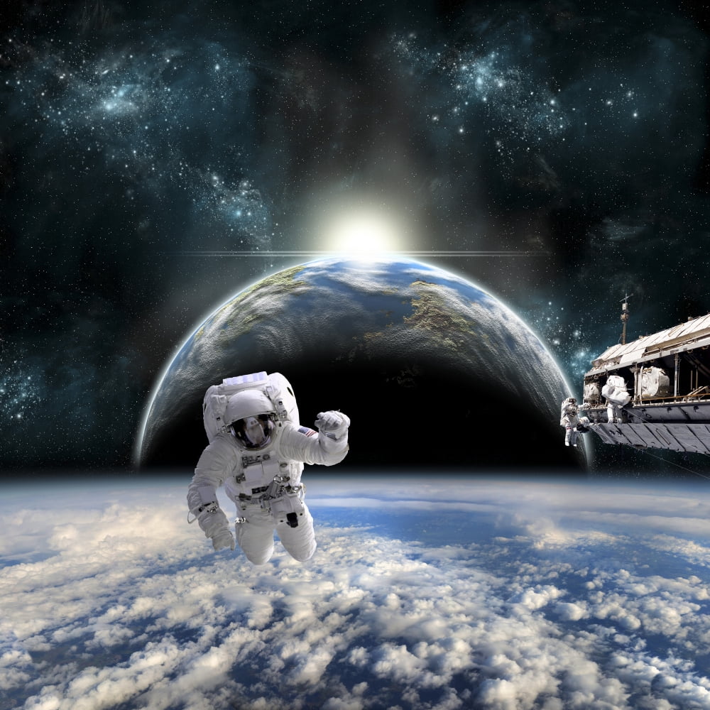 Astronauts work on a space station while the sun rises on an Earth-like planet Canvas Art - Marc WardStocktrek Images (29 x 29)