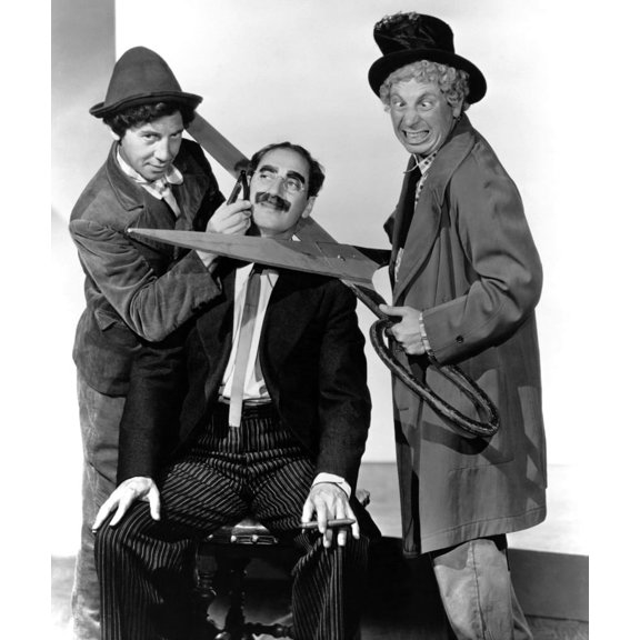 At The Circus From Left: Chico Marx Groucho Marx Harpo Marx 1939 Photo Print (16 x 20)
