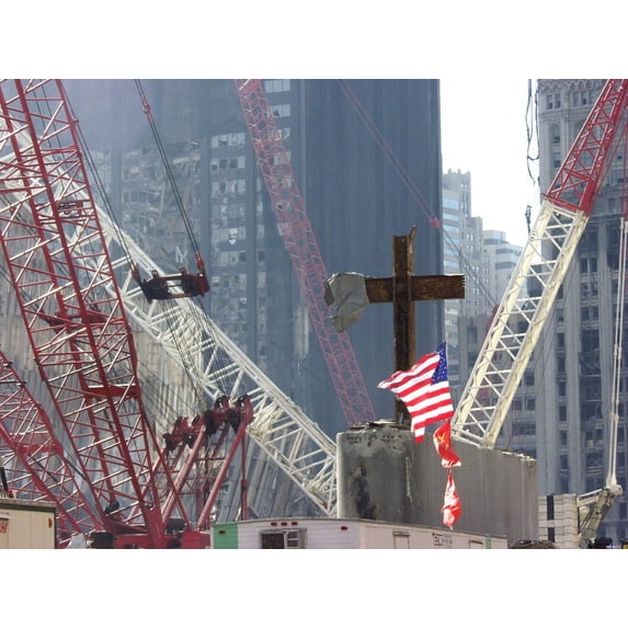 At The World Trade Center Disaster Site Workers Use Heavy Machinery To Remove One Of The Steel Beams From The Section Dubbed 'God'S House' In Reference To The Many Crosses Inside History (36 x 24)