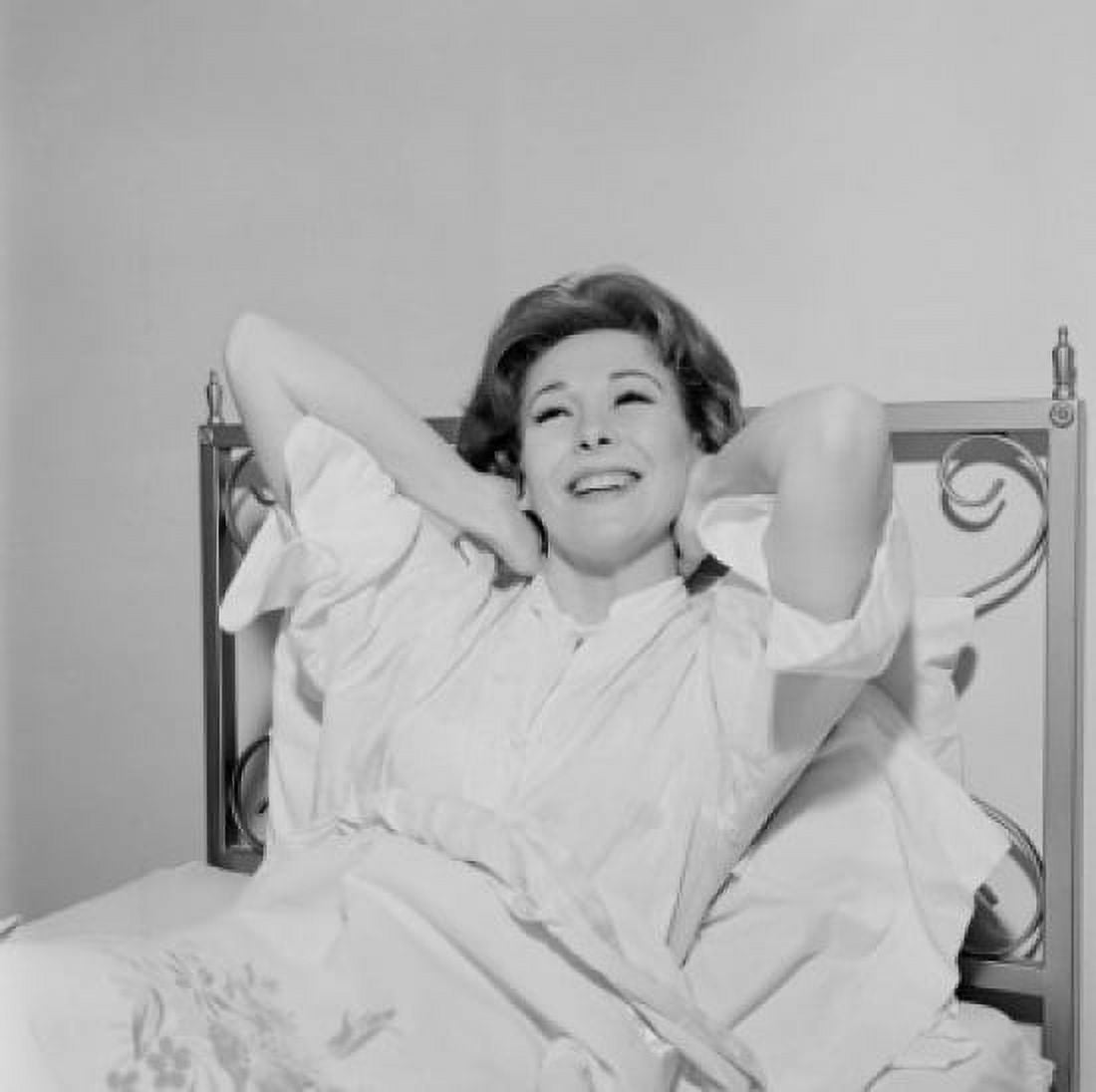 Attractive woman stretching in bed Canvas Art - (18 x 24)