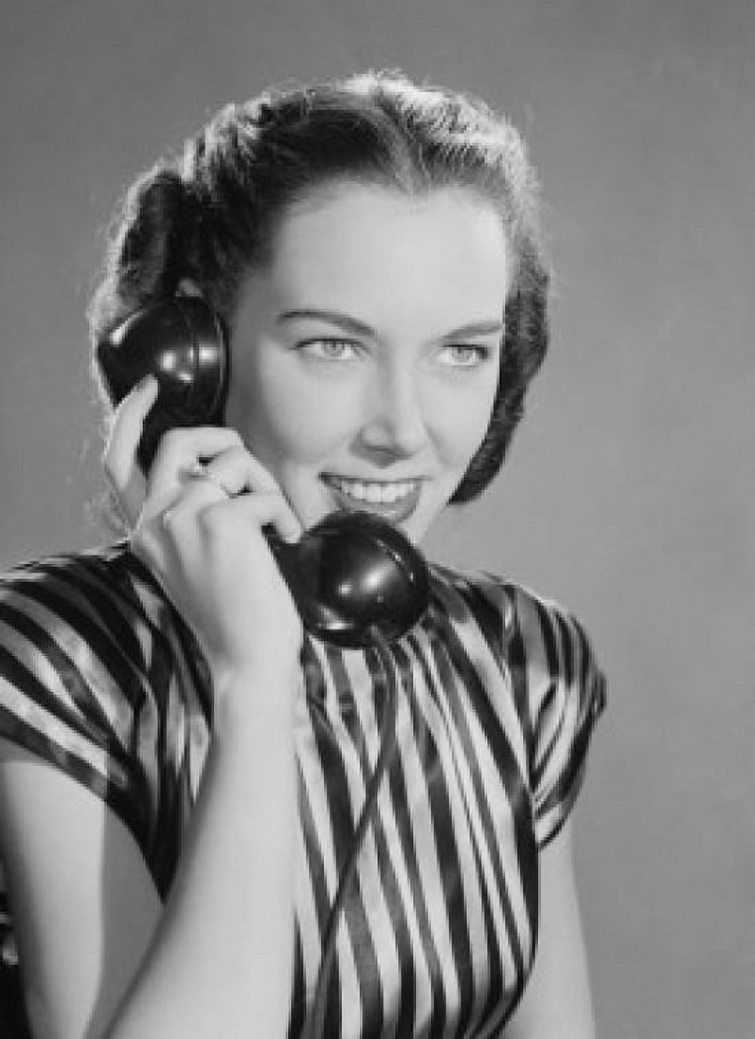 Attractive young woman talking on the phone Canvas Art - (24 x 36)
