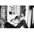 thumbnail image 1 of Audrey Hepburn in Breakfast at Tiffany's 24x36 Poster playing guitar, 1 of 1