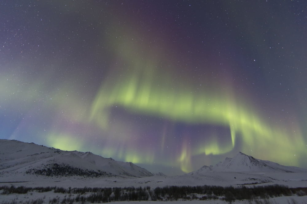 Aurora Borealis At Twilight Above Angelcomb Mountain Along The Dempster Highway Yukon Canada Canvas Art - Robert Postma Design Pics (38 x 24)