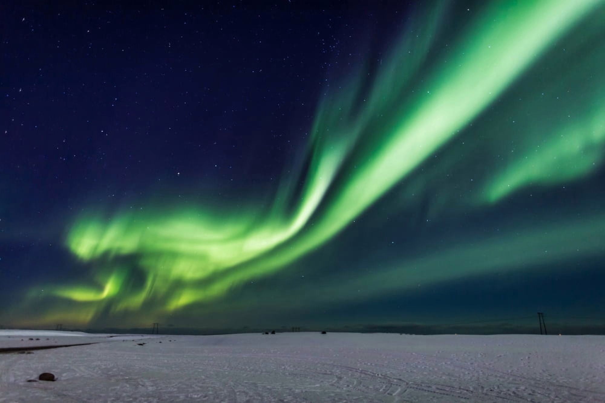 Aurora Borealis or Northern lights Iceland Power lines by the Jokulsarlon Breidamerkurjokull Vatnajokull Ice Cap Iceland Canvas Art - Panoramic Images (36 x 12)