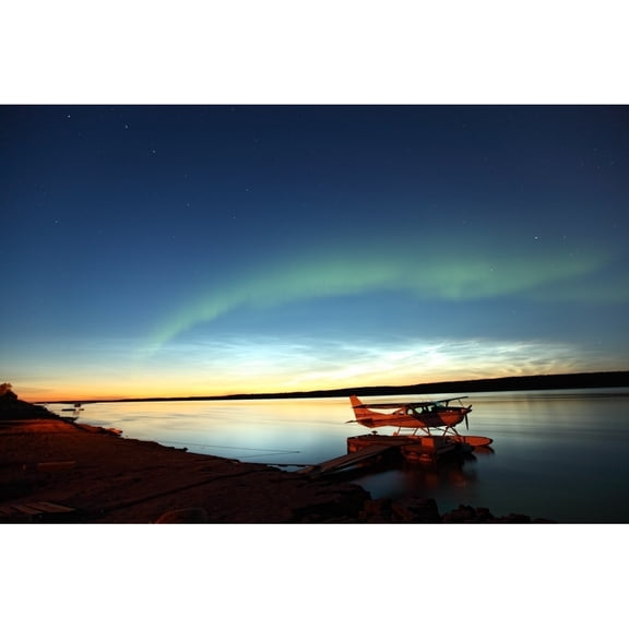 Aurora Borealis Over The Mackenzie River With Float Planes In Foreground Fort Simpson Northwest Territories