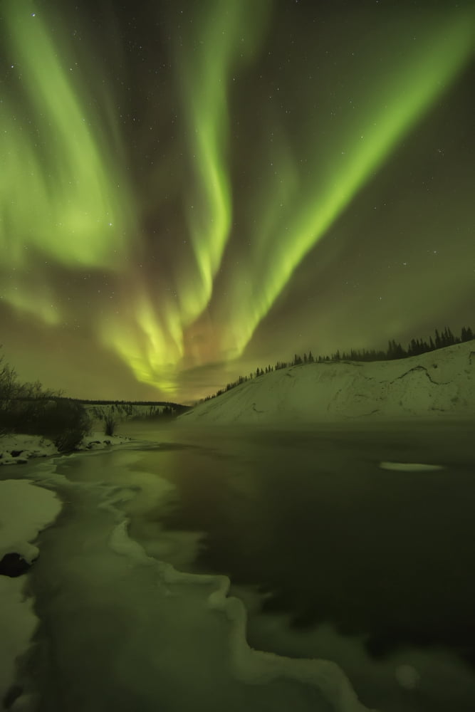 Aurora Borealis Over The Yukon RiverYukon Canada Canvas Art - Robert Postma Design Pics (12 x 19)