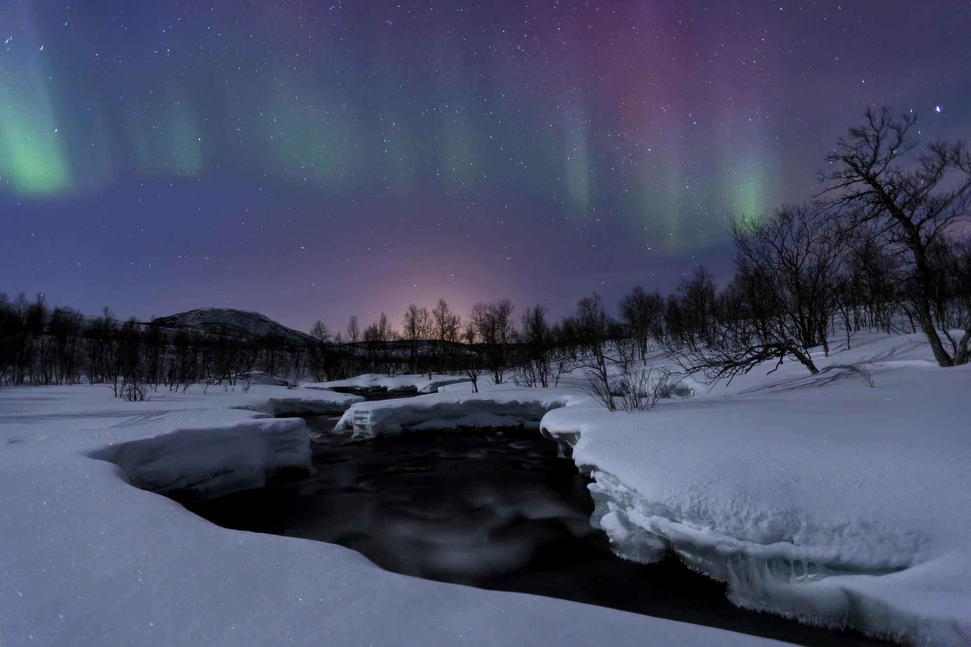 Aurora Borealis over Blafjellelva RIver in Troms County Norway Canvas Art - Arild HeitmannStocktrek Images (35 x 23)