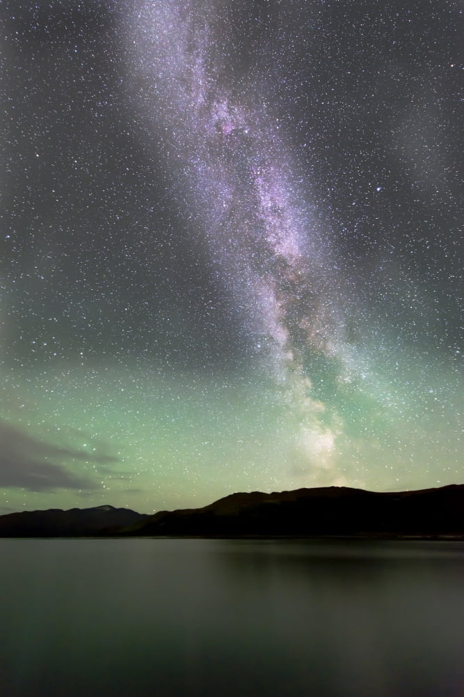 Aurora borealis and Milky Way above Fish Lake Yukon Canada Canvas Art - Jonathan TuckerStocktrek Images (23 x 35)