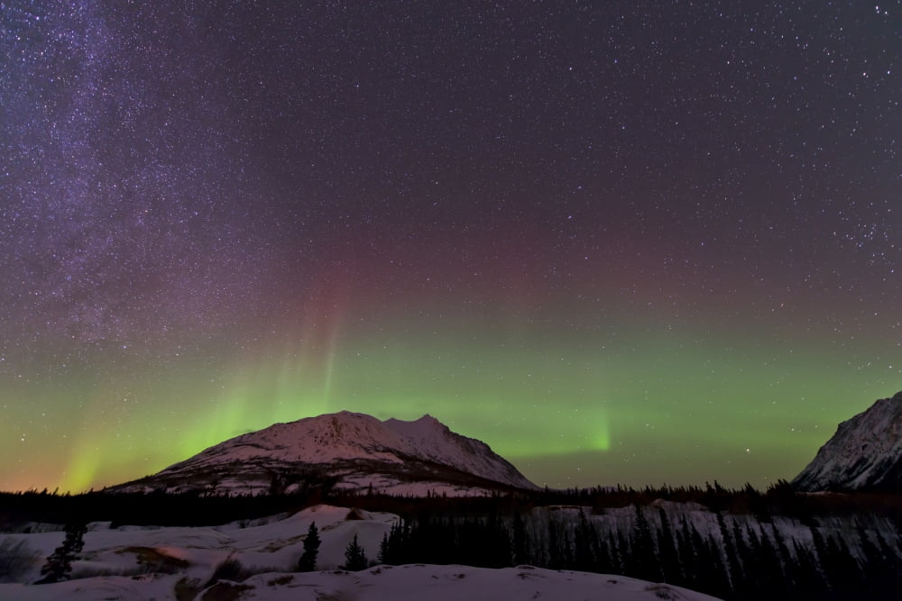 Aurora borealis and Milky Way over Carcross Yukon Canada Canvas Art - Jonathan TuckerStocktrek Images (18 x 12)