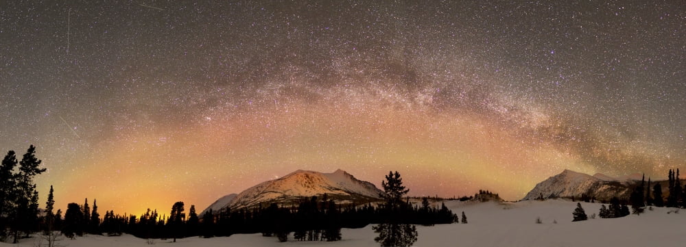 Aurora borealis and Milky Way over Yukon Canada Canvas Art - Joseph BradleyStocktrek Images (47 x 17)