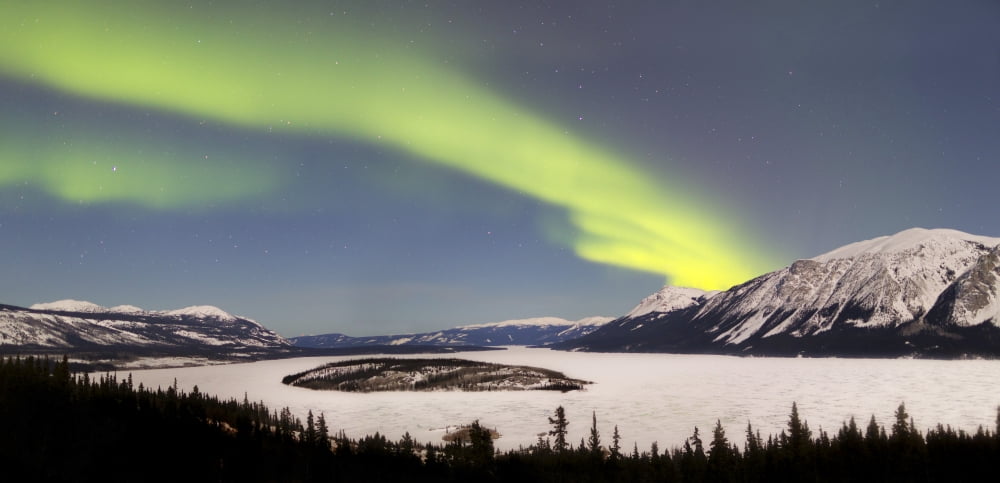 Aurora borealis over Bove Island Yukon Canada Canvas Art - Joseph BradleyStocktrek Images (41 x 20)