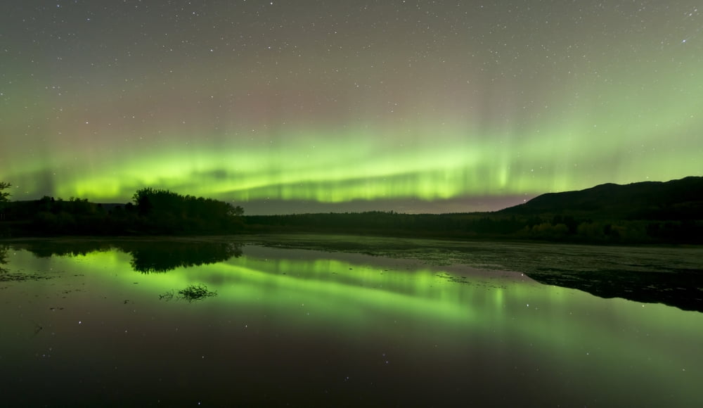 Aurora borealis over Fish Lake Whitehorse Yukon Canada Canvas Art - Jonathan TuckerStocktrek Images (37 x 22)
