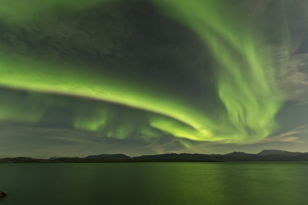 Aurora borealis over Fish Lake Yukon Canada Canvas Art - Jonathan TuckerStocktrek Images (18 x 12)