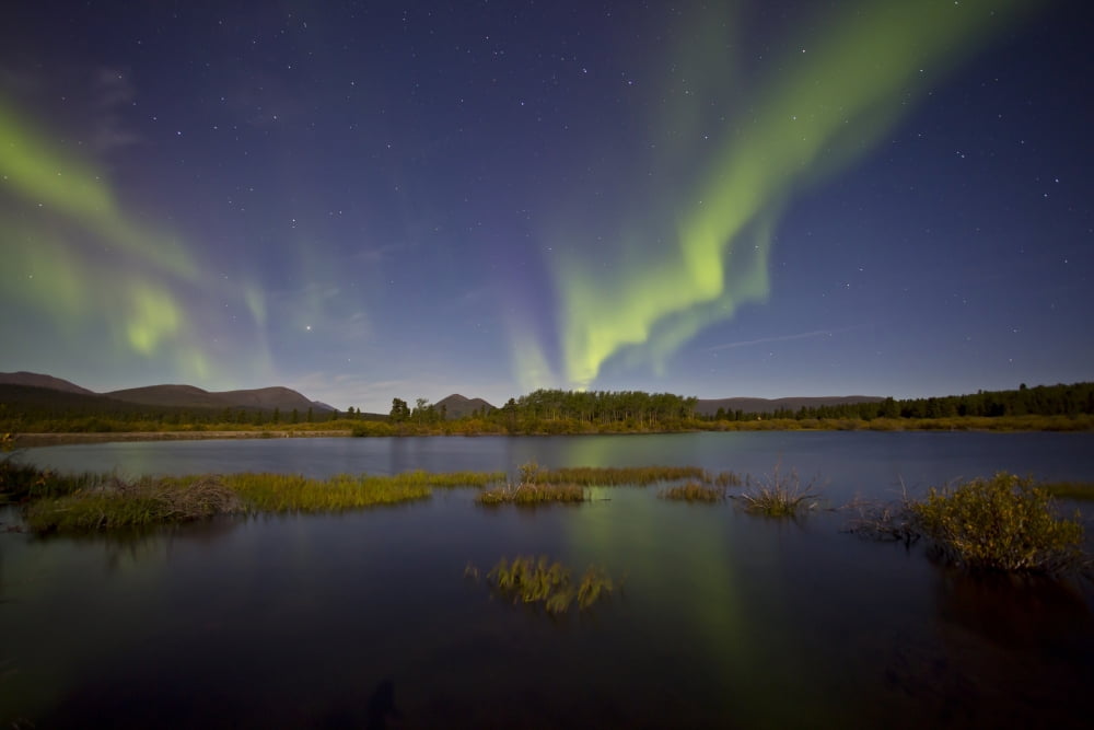 Aurora borealis over Fish Lake Yukon Canada Canvas Art - Jonathan TuckerStocktrek Images (18 x 12)