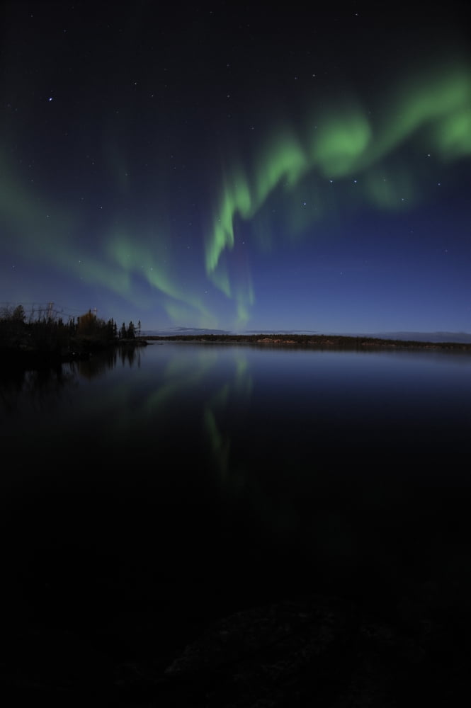 Aurora borealis over Long Lake Northwest Territories Canada Canvas Art - Jiri HermannStocktrek Images (23 x 35)