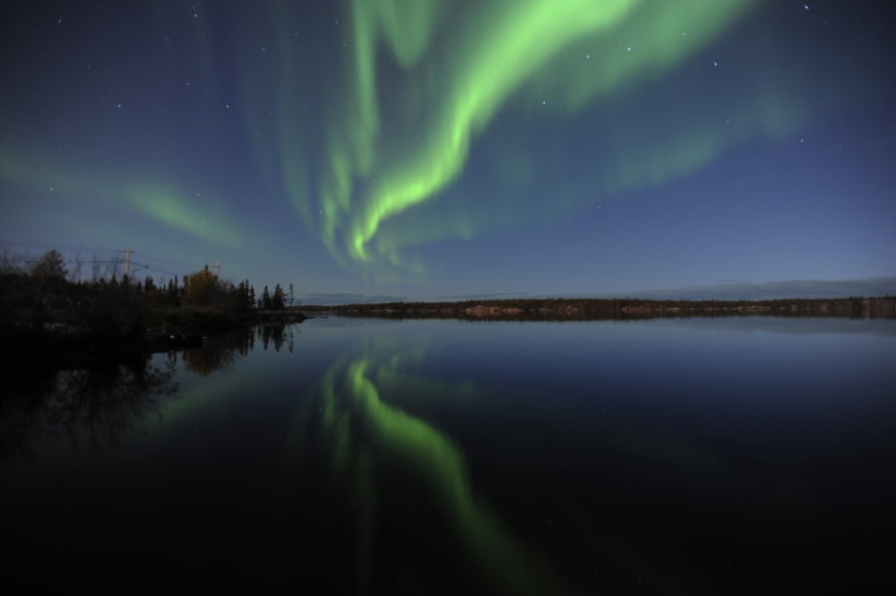 Aurora borealis over Long Lake Northwest Territories Canada Canvas Art - Jiri HermannStocktrek Images (35 x 23)