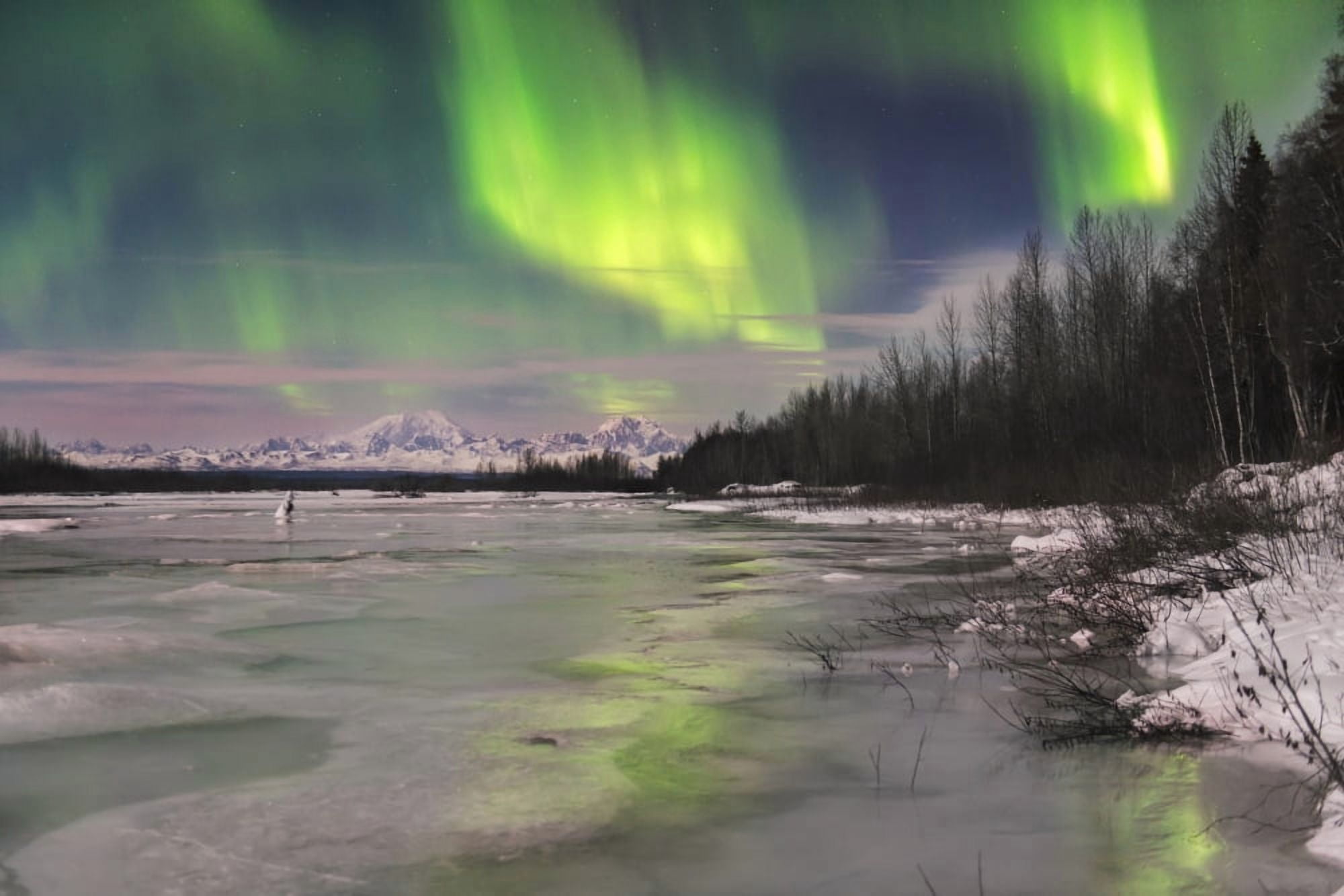 Aurora borealis over frozen Susitna River with Mt Foraker and Mt Hunter in the background Canvas Art - Carl Johnson Design Pics (19 x 12)