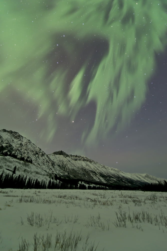 Aurora borealis over mountain Annie Lake Yukon Canada Canvas Art - Jonathan TuckerStocktrek Images (23 x 35)