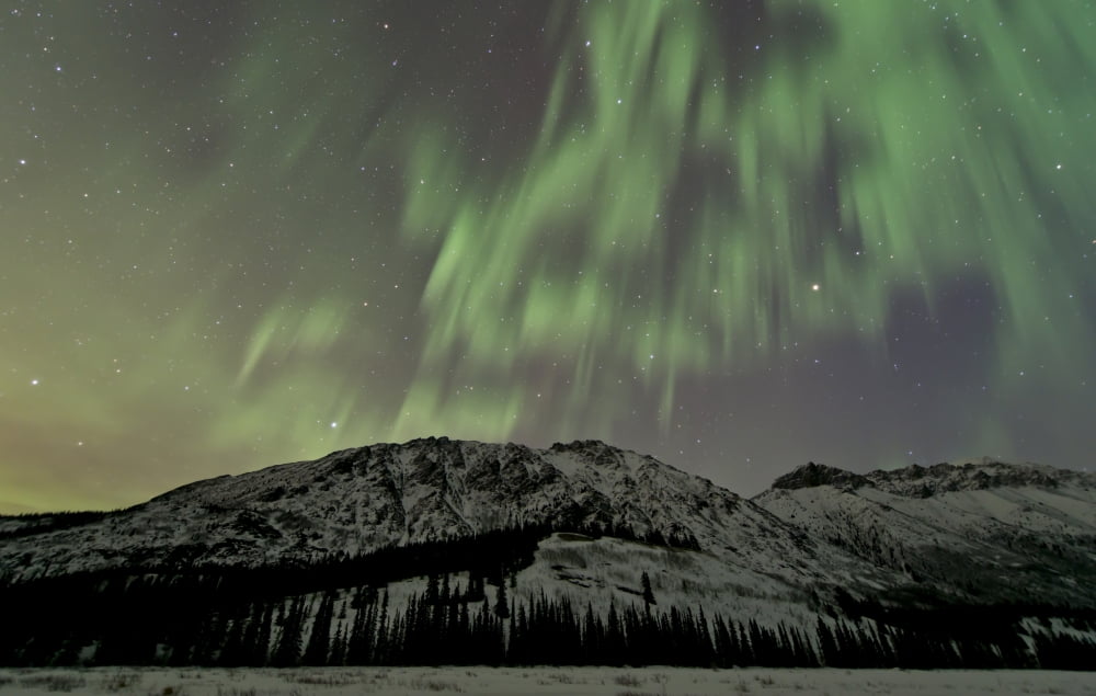 Aurora borealis over mountain Annie Lake Yukon Canada Canvas Art - Jonathan TuckerStocktrek Images (35 x 22)