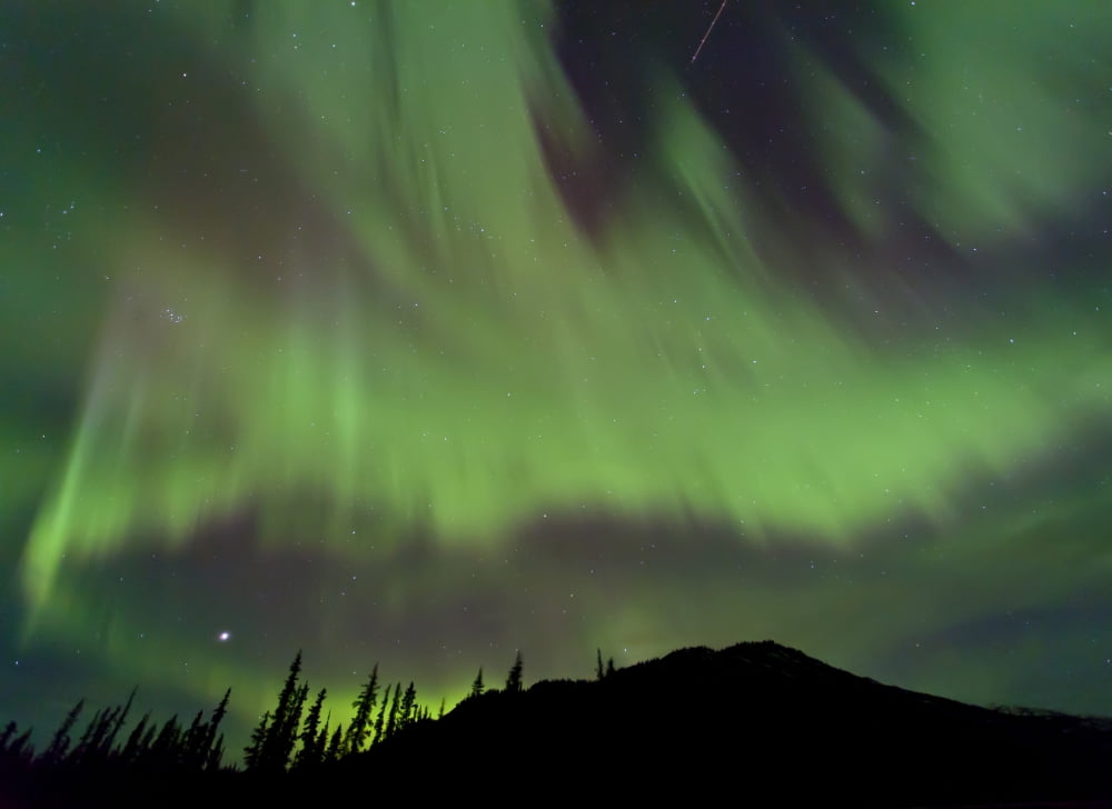 Aurora borealis over mountain Marsh Lake Yukon Canada Canvas Art - Jonathan TuckerStocktrek Images (17 x 12)