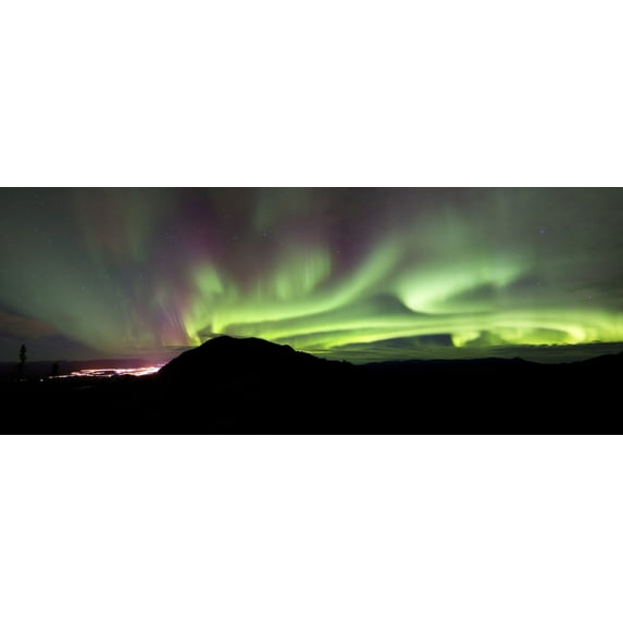 Aurora borealis over the city of Whitehorse, with Gray Mountain, Whitehorse, Yukon, Canada Poster Print (22 x 8)