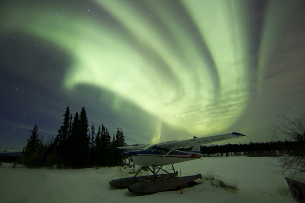 Aurora borealis with float plane Whitehorse Yukon Canada Canvas Art - Joseph BradleyStocktrek Images (18 x 12)