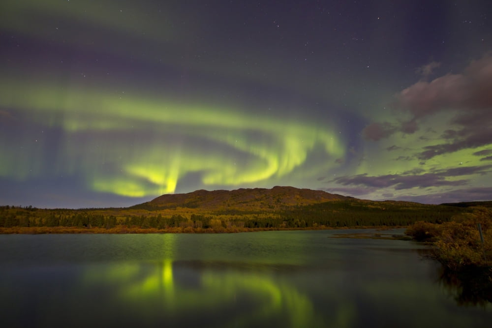 Aurora borealis with moonlight at Fish Lake Yukon Canada Canvas Art - Joseph BradleyStocktrek Images (18 x 12)