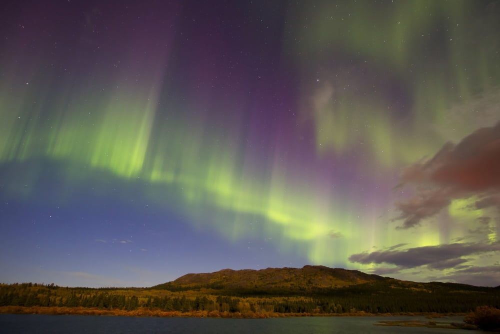 Aurora borealis with moonlight at Fish Lake Yukon Canada Canvas Art - Joseph BradleyStocktrek Images (18 x 12)