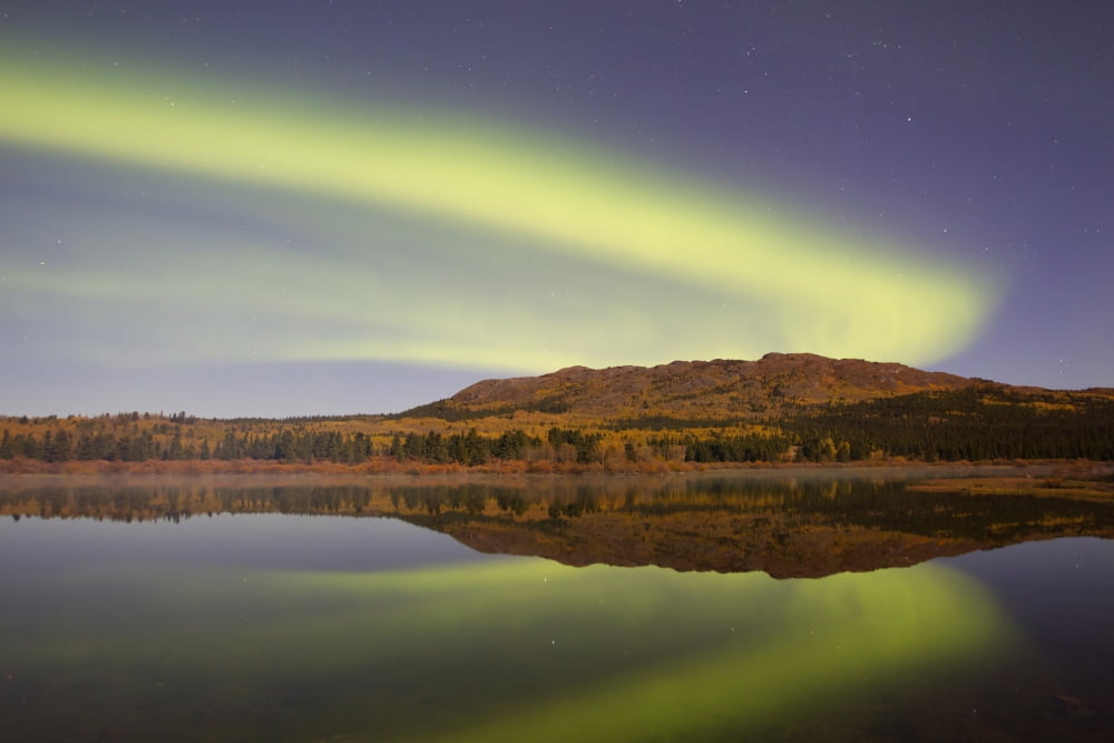 Aurora borealis with moonlight at Fish Lake Yukon Canada Canvas Art - Joseph BradleyStocktrek Images (35 x 23)
