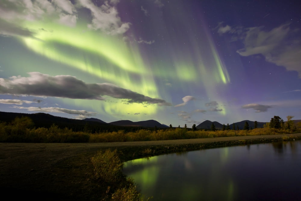 Aurora borealis with moonlight at Fish Lake Yukon Canada Canvas Art - Joseph BradleyStocktrek Images (35 x 23)