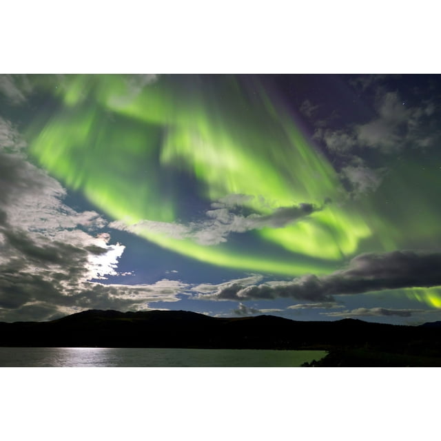 Aurora borealis with moonlight over Fish Lake, Whitehorse, Yukon