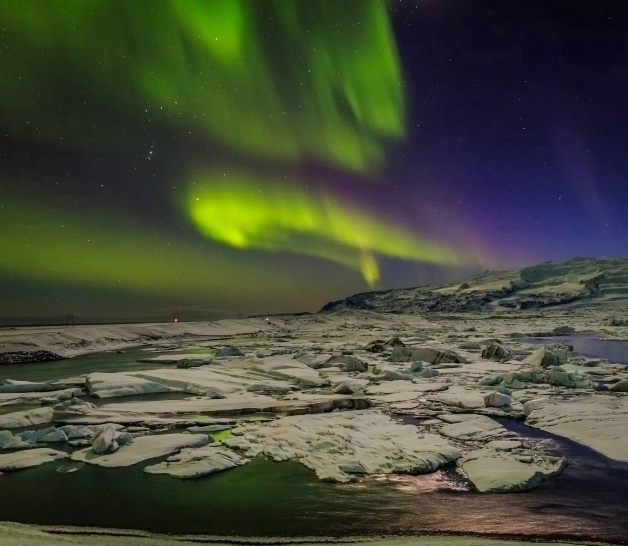 Auroras and Icebergs at the glacial lagoon Jokulsarlon Breidamerkurjokull Vatnajokull Ice Cap Iceland Canvas Art - Panoramic Images (24 x 24)