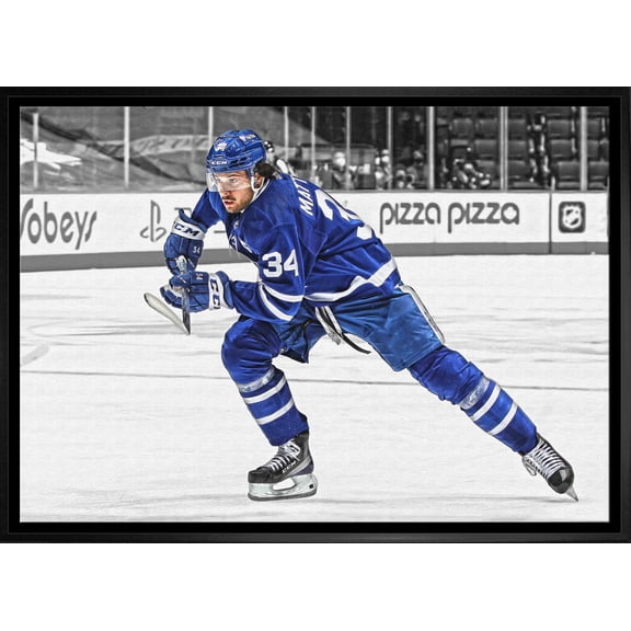 Auston Matthews Toronto Maple Leafs Framed 20x29 Hustling Spotlight Canvas