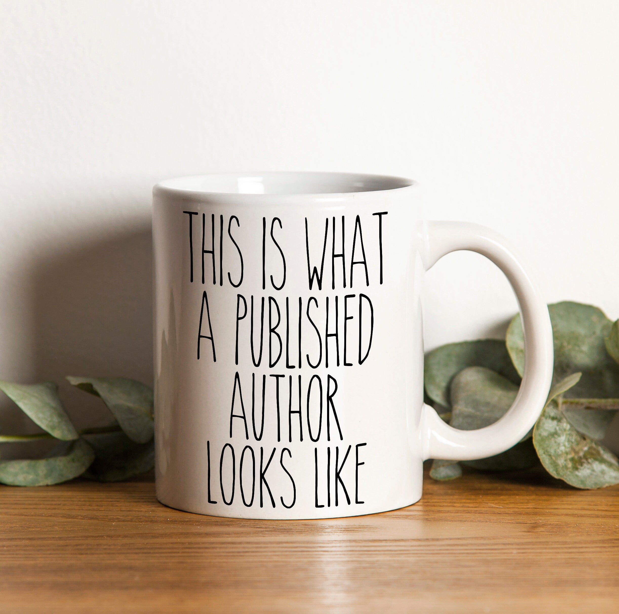 White Ceramic Mug with Black Handle and Inner for Authors