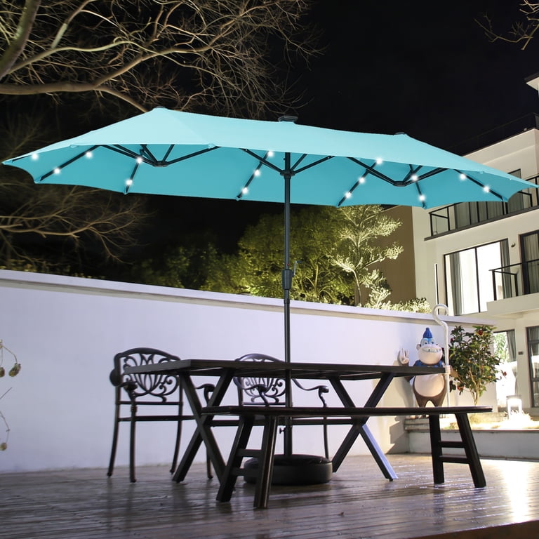 can you replace the fabric on a patio umbrella How to Paint Outdoor Fabric to Makeover an Old Umbrella