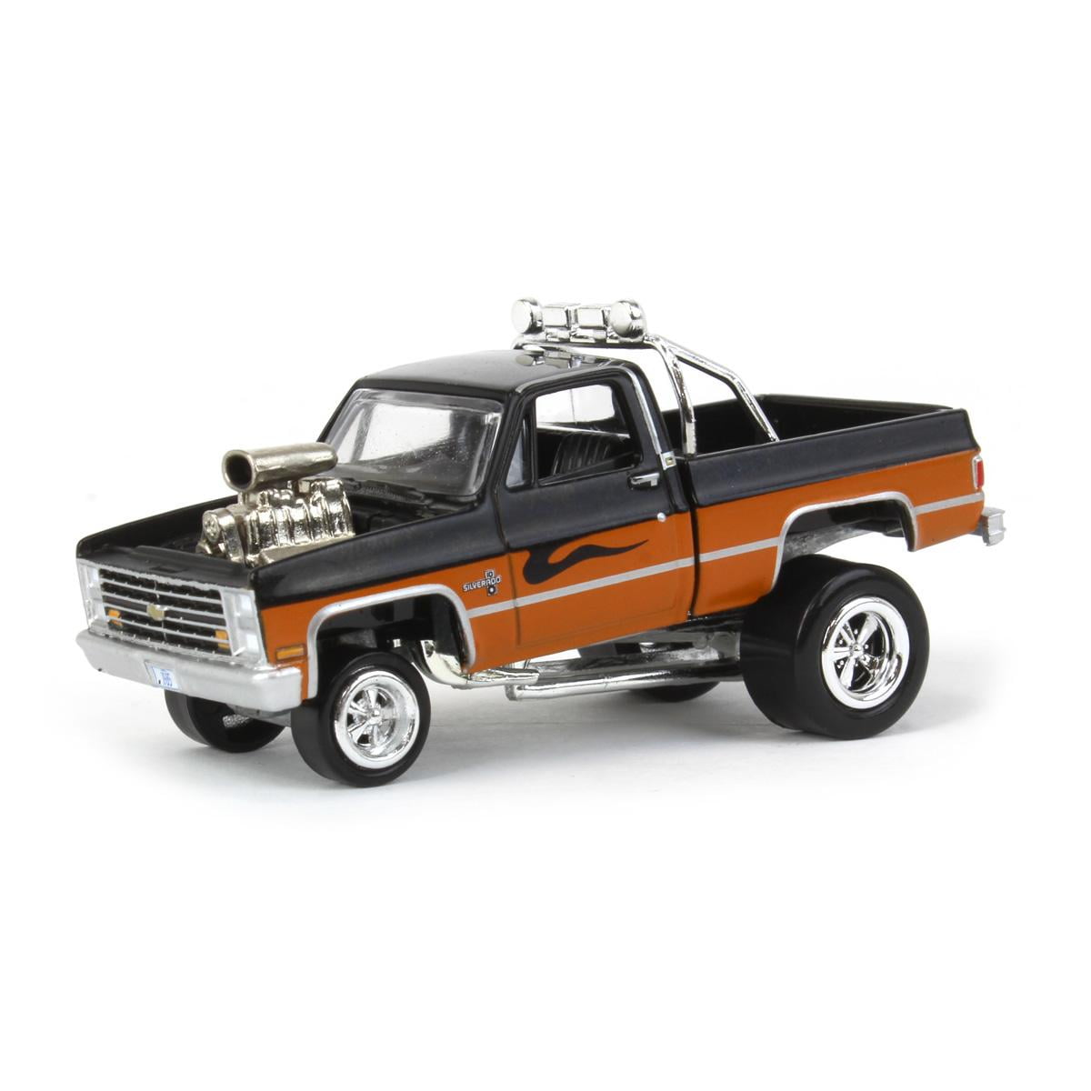 Auto World 1/64 1985 Chevrolet Silverado, Black and Orange Auto World 1/64 1985 Chevrolet Silverado, Black and Orange