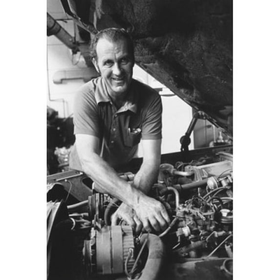 Auto mechanic repairing a car Poster Print (18 x 24)
