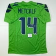 thumbnail image 1 of Autographed/Signed DK D.K. Metcalf Seattle Green Football Jersey Beckett BAS COA, 1 of 4