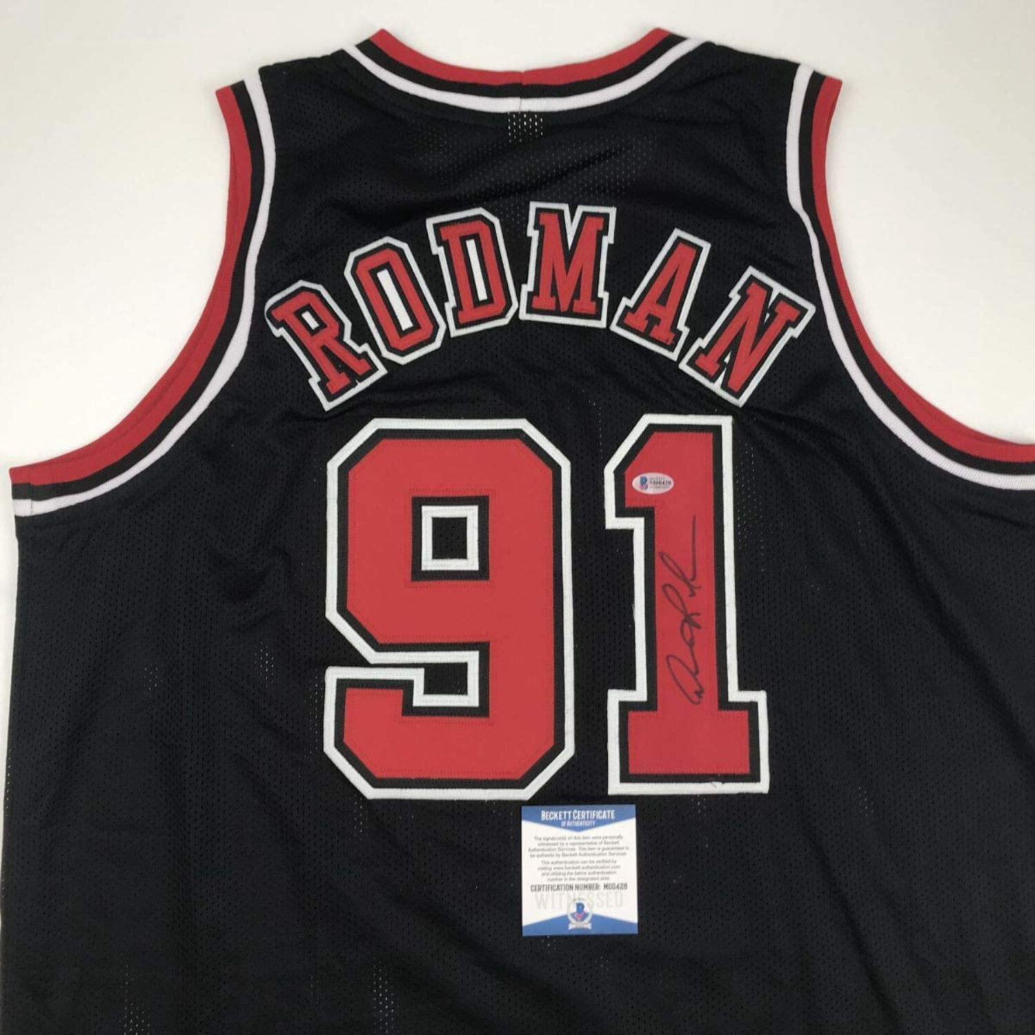 Dennis Rodman Autographed Chicago Bulls Black Jersey – JSA Certified, Gem Mint