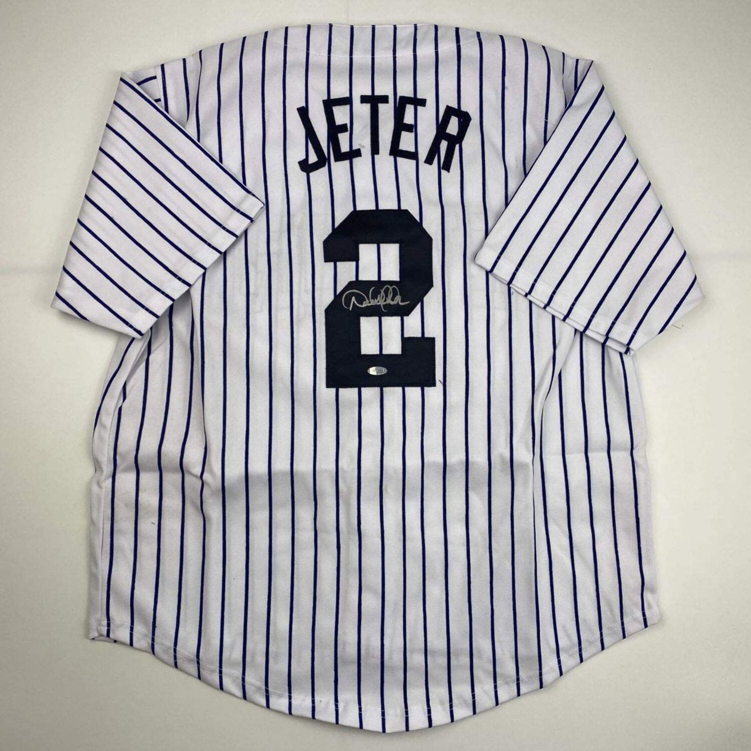 Autographed/Signed Derek Jeter New York Pinstripe Baseball Jersey