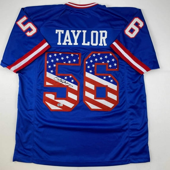 Autographed/Signed Lawrence Taylor New York Blue USA American Flag Football Jersey Beckett BAS COA