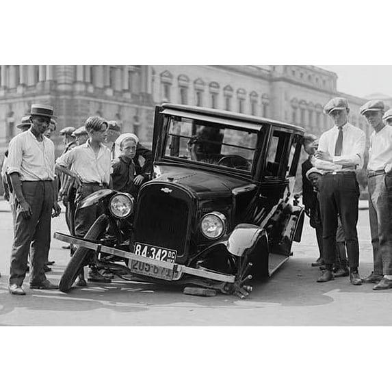 Automobile apparently hit the curb and cracked its front axel following which are attracted a group of onlookers-Fine art canvas print (20" x 30")
