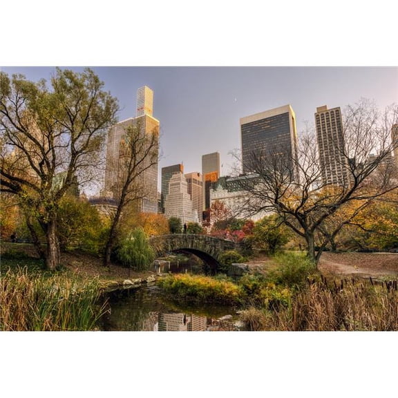 Autumn coloured foliage around Gapstow Bridge, Central Park; New York City, New York, United States of America Poster Print (38 x 24)
