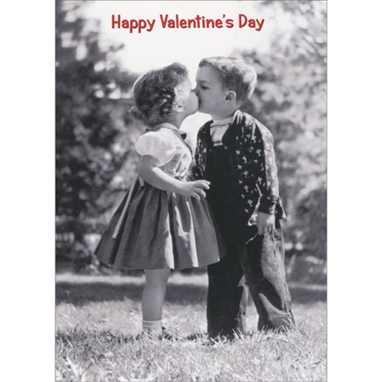 Avanti Press Girl and Boy Kissing on Lawn Black and White Photo
