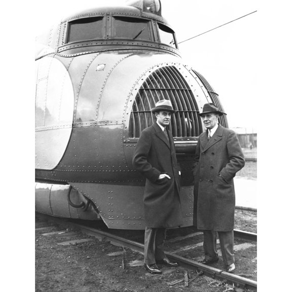 Averill Harriman And Charles Kettering Next To The New Union Pacific 120 Mile An Hour Train. Feb.12 History